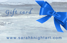 Load image into Gallery viewer, Gift card with a blue bow on a textured gray background, featuring the website www.sarahknightart.com.